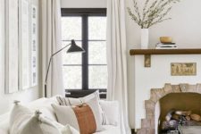 25 a 1920s Spanish-inspired living room with layered neutrals done in an analogous color scheme