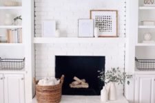 25 a farmhouse living room with a white brick clad fireplace to accent it and all neutrals around