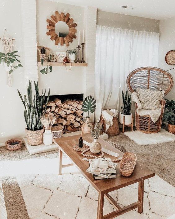 a wooden frame mirror, potted plants, rugs and throws, many woven elements for a welcoming boho living room