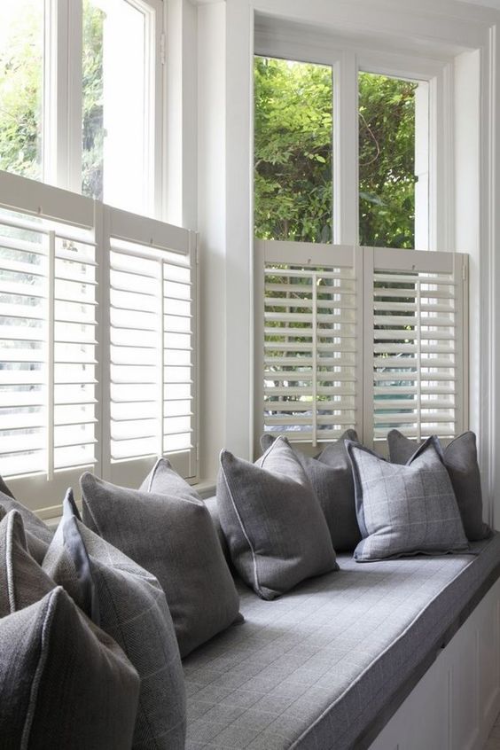 such half window shutters will keep you away from excessive sunlight while you are reading on this daybed