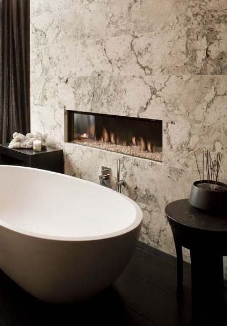 having a bath by the fire is a unique experience that will bring ultimate relaxation