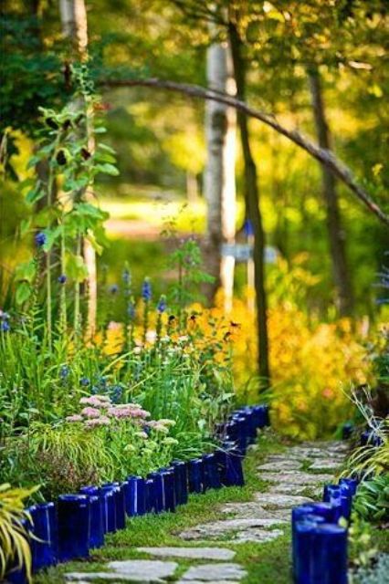bright blue bottle garden edging will bring much color and a relaxed rustic feel to your garden
