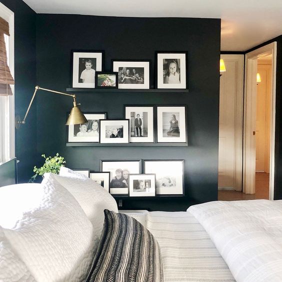 add a gallery wall of family photos using inexpensive photo ledges to cozy up the space