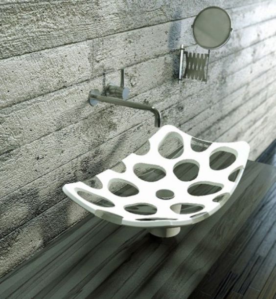 a white and sheer spotted vessel sink with a catchy shape will spruce up your bathroom even more