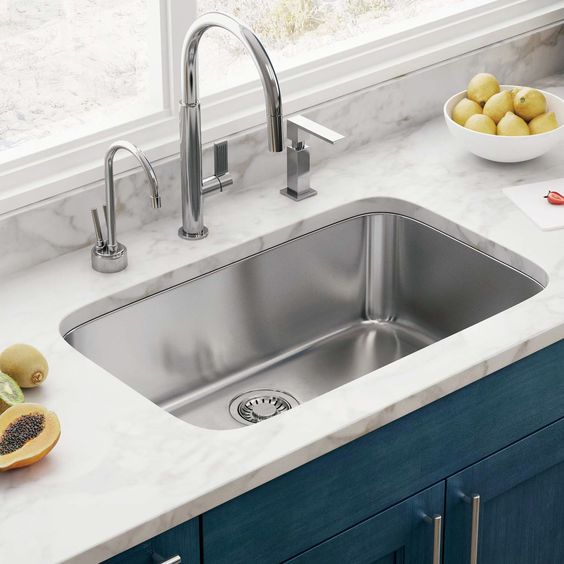 curved angles of this rectangular undermount sink give it a fresher and more modern look and feel