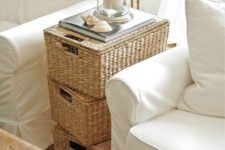 03 a stack of wicker baskets will work as a coffee table and as storage units, and it will match many spaces