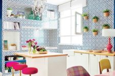 03 super bright pink stools with gold bases stand out in the blue and white kitchen and add a glam feel to the space