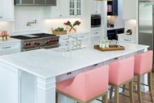 05 pink stools to refresh the monochromatic kitchen and add a fun modern touch to the vintage-inspired space