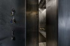 06 Most of the apartment is clad with aged metal to give it an industrial feel