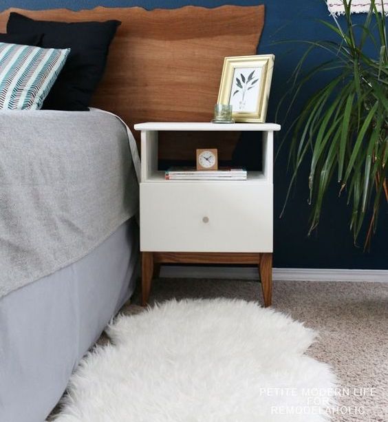 an IKEA Tarva nightstand spruced up with white paint, stained legs and a knob is a very cool idea