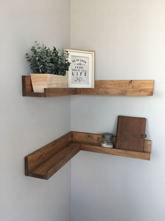 simple stained corner shelves that are ledges at the same time will keep your things in place