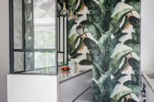 10 a kitchen refreshed and made brighter with tropical leaf print wallpaper on the statement wall
