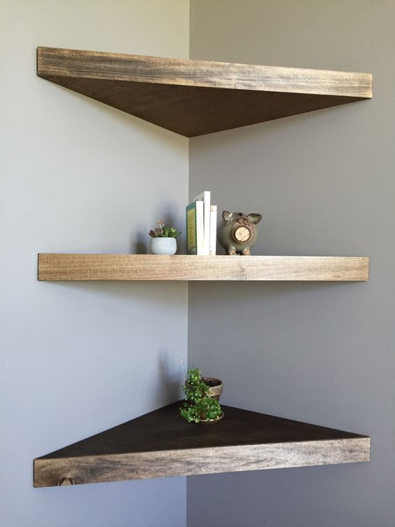 Stylish thick triangle shaped wooden shelves with a shiny edge look very chic and stylish