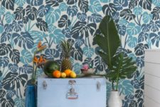 11 tropical lead wallpaper done in navy and light blue is a very non-traditional and bold combo