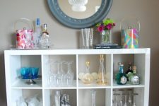 12 an IKEA Kallax shelving unit placed on legs is a cool idea with plenty of storage for all types of glasses