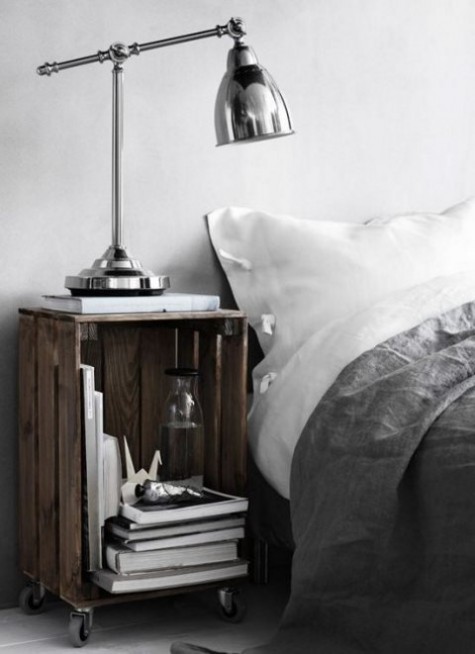 a stained Knagglig box placed on casters as a bedside table that can be moved anywhere and provides storage space