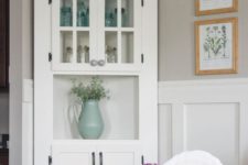 16 a vintage-inspired white corner cabinet is great for displaying all types of tableware and plates