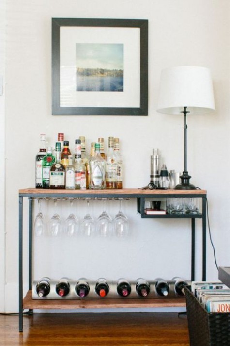 an IKEA Vittsjo table renovation into a rustic home bar with wooden countertops and a plenty of storage space