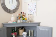 21 use a corner cabinet to make up a stylish home bar with plenty of storage
