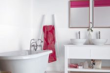 23 a contemporary bathroom that combines white and fuchsia and looks bright, cheery and bold