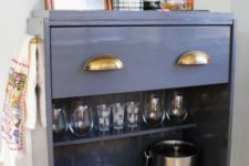 23 an IKEA Rast dresser turned into a stylish home bar on casters with a drawer and an open storage compartment