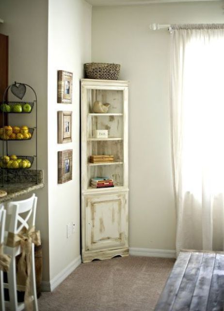 a distressed neutral corner cabinet is a chic idea for a living or dining room, you can DIY one