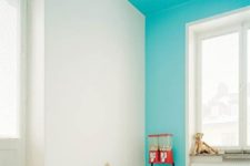 24 a simple bedroom spruced up with a turquoise ceiling that comes down to the walls for a brighter touch