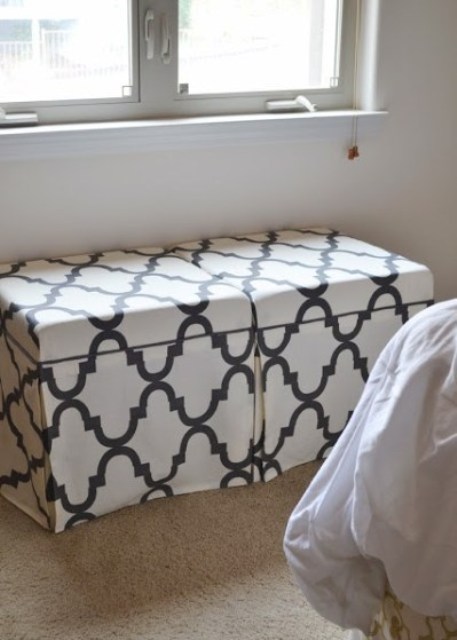 IKEA Lack coffee tables with printed black and white fabric slipcovers is a stylish idea for an ottoman