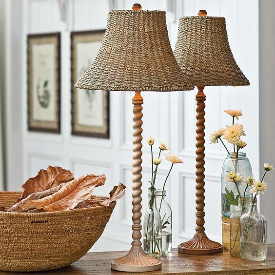vintage-inspired table lamps with carved wooden legs and wicker lampshades will bring that vintage beach cottage esthetics