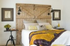 26 a rustic meets modern bedroom with a bright yellow ceiling and a matching blanket and a side table