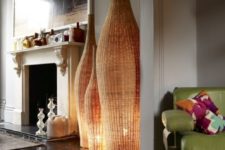 26 unique oversized bottle shaped wicker lamps will make a statement in the space and make it bright and chic