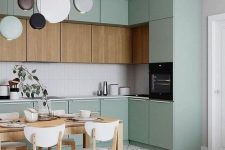 a lovely sage green kitchen design