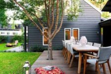 an outdoor dining space in scandi style