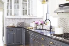 this grey and white kitchen with dark countertops features two trends in one – two colors and contrasting countertops