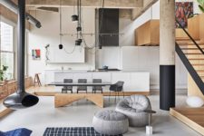 01 This gorgeous industrial meets minimalist loft features structural details and cool furniture arrangement to get maximum of the apartment