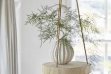 05 a cool and easy hanging shelf of a thick wood slice and ropes can be easily DIYed and will add a dreamy feel to the space