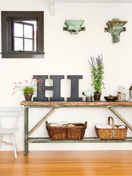 a summer console table done with letters, potted greenery and blooms, baskets and shabby chic details