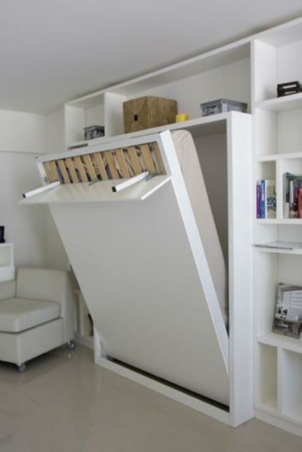 this is how you open a Murphy bed, the legs are hidden under a cover for a sleek look