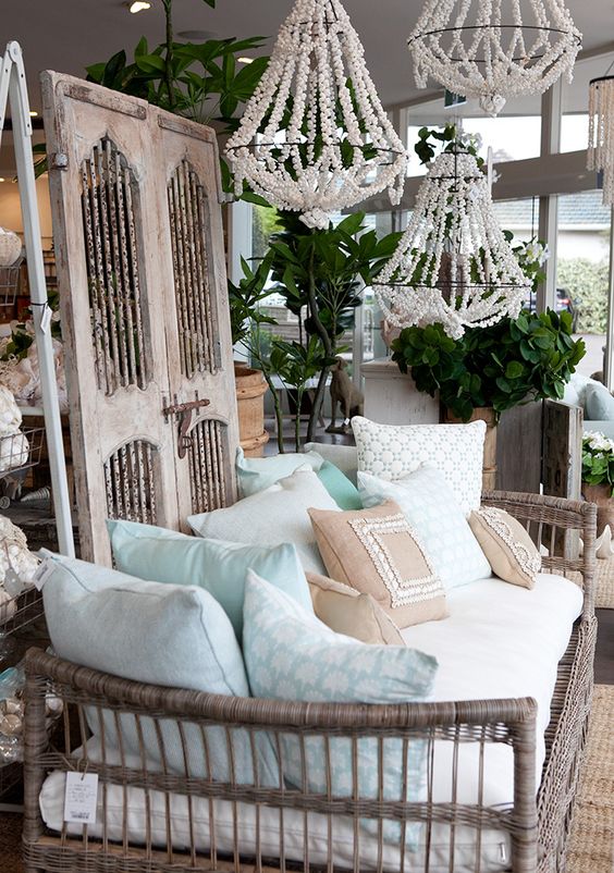 a cane daybed with a ton of pillows feels very outdoorsy and will perfectly fit a rustic or boho space
