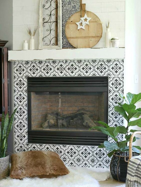 Monochromatic tiles with a beautiful Moroccan inspired pattern add a boho feel to the living room