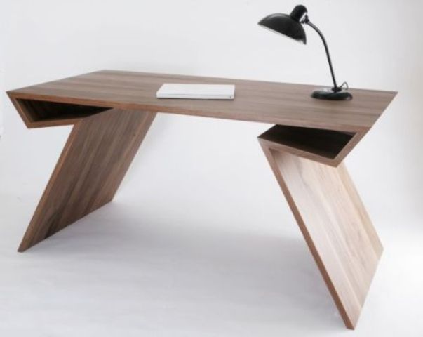 A sculptural desk feels mid century modern yet looks rather contemporary plus features some storage niches