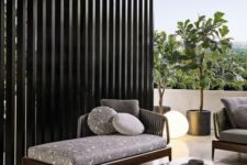 12 a modern dark stained outdoor daybed looks elegant and simple and will work for many outdoor spaces