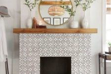 13 elegant monochromatic pattern tiles and a black touch on the floor make up a chic rustic look