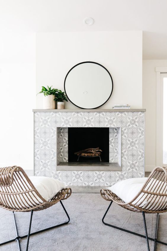 keep the space neutral with grey and white patterned mosaic tiles that add chic and elegance to the piece