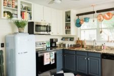 15 a retro kitchen with a black and white tile floor, colorful pots and pans and a retro-inspired pastel fridge