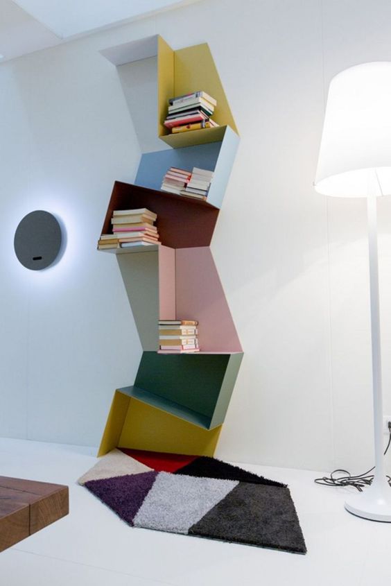 a creative colorful geometric shelving unit done of several parts and in various colors