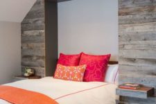18 a Murphy bed and pull-out nightstands disappear into the reclaimed wood wall when not needed
