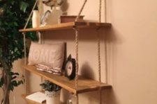 18 a rustic hanging shelf with ropes and simple wooden shelves can be DIYed for any space of your home