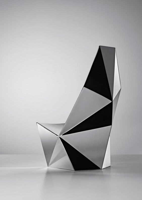 a geometric lounge chair inspired by diamonds and rocks looks amazing and will fit many modern or minimal spaces