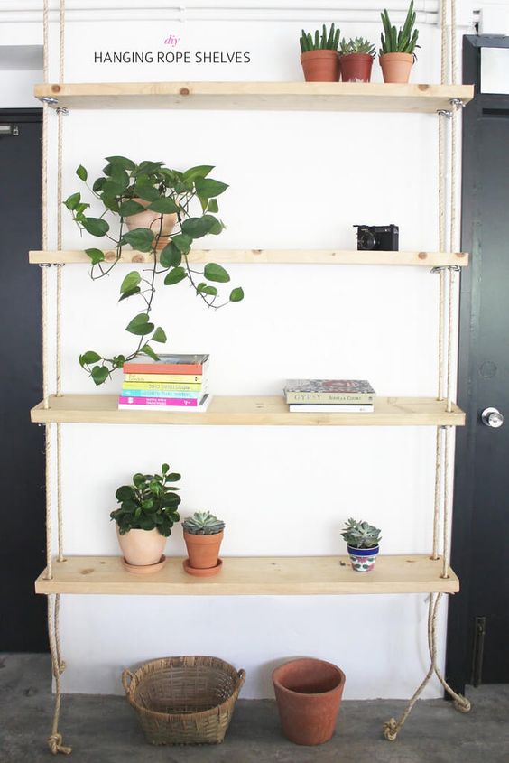 a simple contemporary hanging shelving unit with ropes can be a perfect solution for an awkward nook